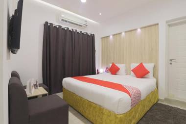 Capital O 31424 Gold Hotel