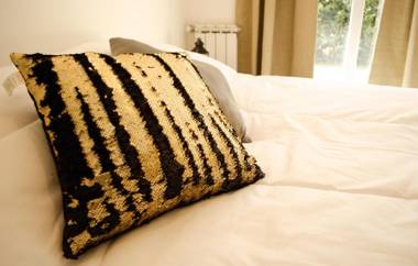 Aiksh Estudio H-3 Pax parrilla y estacionamiento