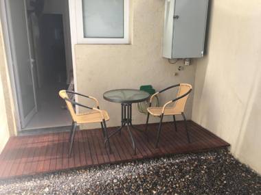 Edificio Nikemen moderno dpto con patio y cochera cubierta