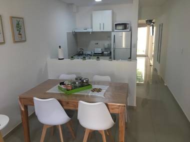 Edificio Nikemen moderno dpto con patio y cochera cubierta