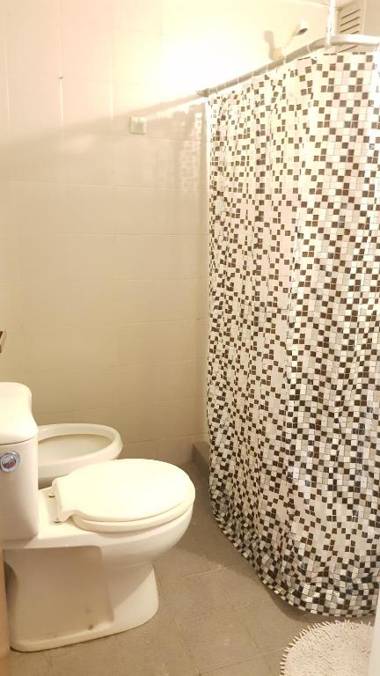 Luminoso Departamento de Estadia Temporaria