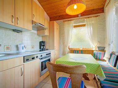 Quaint Chalet with Garden Terrace FireplacePlay Equipment