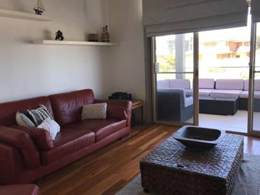 Sunset on Birubi' - pet friendly air con water views WIFI and outdoor spa