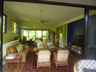 8 Belle Court - Rainbow Shores - Relax on the deck overlooking bushland whilst listening to the waves crash on the shore