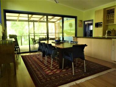 8 Belle Court - Rainbow Shores - Relax on the deck overlooking bushland whilst listening to the waves crash on the shore