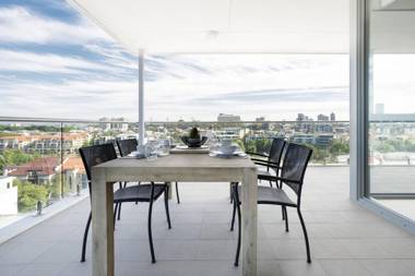 Minimalist Penthouse Condo with Skyline Vistas