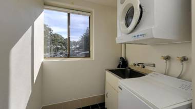 Right on the sands at Little Beach and walk to the heart of Nelson Bay