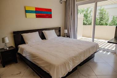 Fabulous modern 2-bedroom apartment with tropical garden pool and jacuzzi