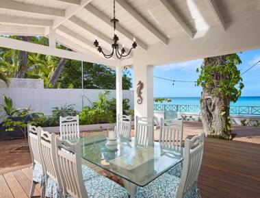 Southwinds Villa is a three bedroom beach front property with a beautiful big in