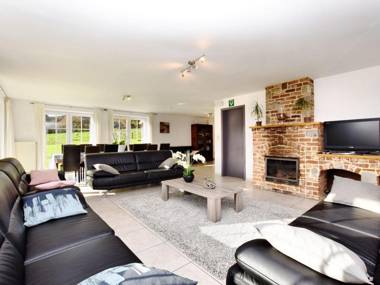 Detached natural stone house with sunny garden and terrace modern interior  