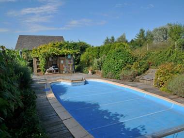 Family home in stunning setting with outdoor swimming pool and large garden