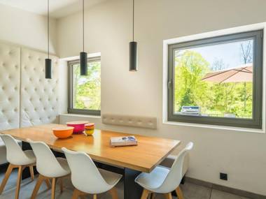 Modern villa with indoor swimming pool in the middle of the Noiseaux nature