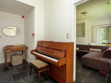 With billiards table tennis and collection of modern art in a rural setting