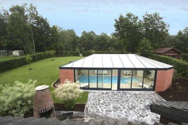 Cottage with swimming pool comprises two separate parts