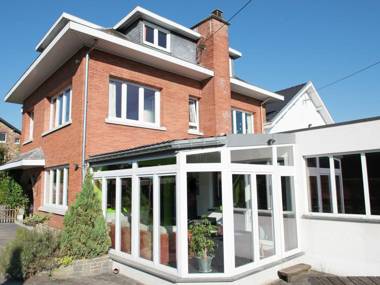 Attached house with playroom indoor swimming pool and sauna in a wooded area