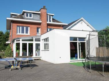 Attached house with playroom indoor swimming pool and sauna in a wooded area