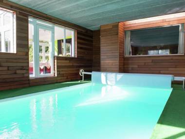 Attached house with playroom indoor swimming pool and sauna in a wooded area