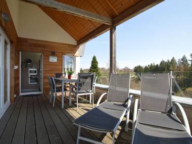 Luxury holiday apartment with a sauna fireplace and views over a lake