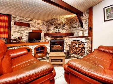 Beautiful authentic chalet with spacious garden covered barbecue and private fish pond