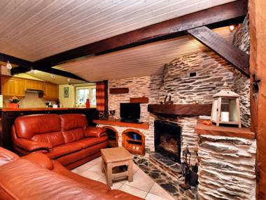 Beautiful authentic chalet with spacious garden covered barbecue and private fish pond