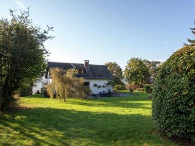 Friendly and rustic family home with fireplace and panoramic views