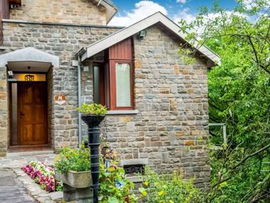A small studio of a nature stone house