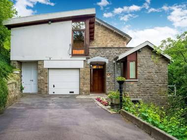 A small studio of a nature stone house