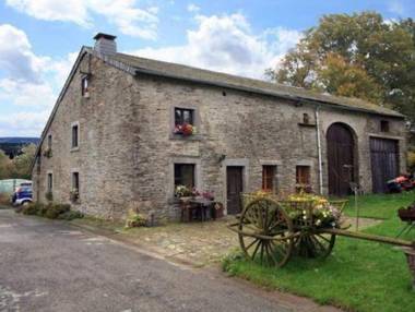 Semi-detached farm situated at the edge of the woods