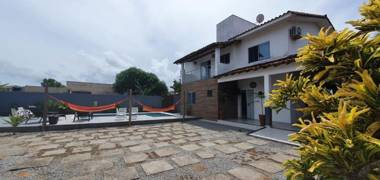 Casa dos Ipês com 3 suítes piscina área gourmet