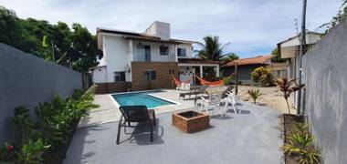 Casa dos Ipês com 3 suítes piscina área gourmet