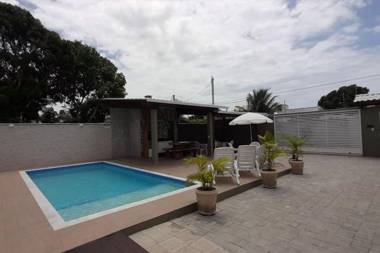 Casa Tocantins com 5 quartos piscina e churrasqueira para 16 pessoas