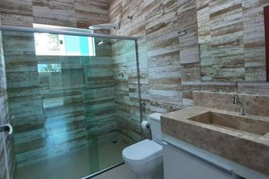 Casa Tocantins com 5 quartos piscina e churrasqueira para 16 pessoas