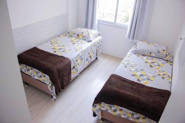 LUXUOSO BEIRA MAR 03 QUARTOS