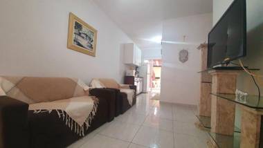 Casa em condomínio com piscina e churrasqueira privativa Wi-Fi 350mts mar