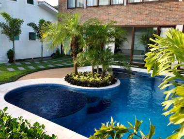 Jardim do Rio Suítes