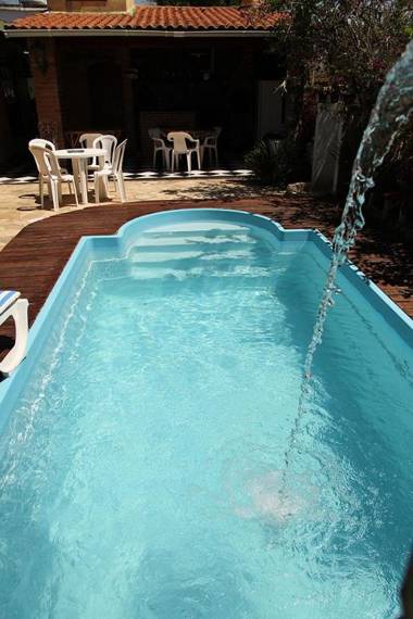 Casa com Piscina Exuberante