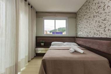 Boulevard Bombinhas 211-B - 50m do mar - Condomínio de Luxo - Piscina Climatizada - Jacuzzi - Portaria 24h