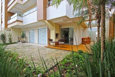 Praia di Capri 01 - Aconchegante apartamento 3 quartos - àrea extrena como uma casa - praia de Bombinhas - 8 pessoas