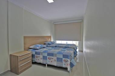 Praia di Capri 01 - Aconchegante apartamento 3 quartos - àrea extrena como uma casa - praia de Bombinhas - 8 pessoas