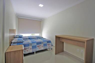 Praia di Capri 01 - Aconchegante apartamento 3 quartos - àrea extrena como uma casa - praia de Bombinhas - 8 pessoas