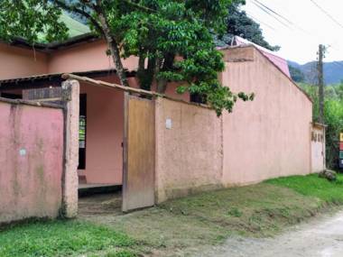 Casa da cachoeira na beira do Rio Sana