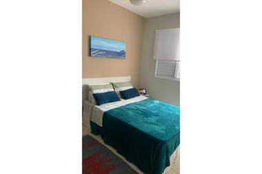 50 metros da praia vista para a serra e o mar