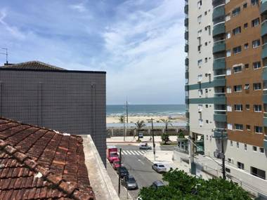 Pé na areia praia Guilhermina