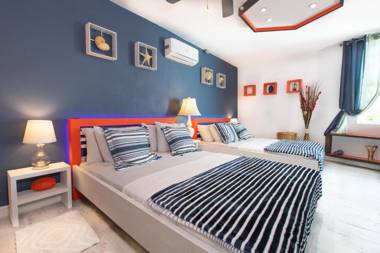 Orange Cottage Steps to the Beach 2 BR