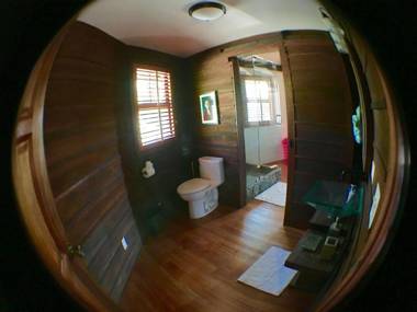 Exotic High End Unique Off-The-Grid Treehouse steps away from the Mopan River!