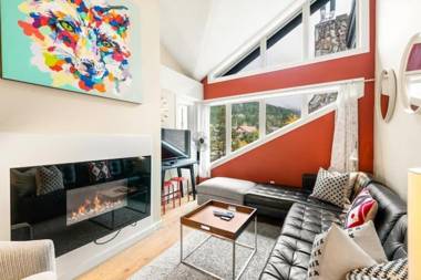 Lofted Suite with Mountain Views and Creekside Location by Harmony Whistler