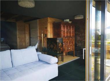 Chalet with view of the mountains and the Thun lake