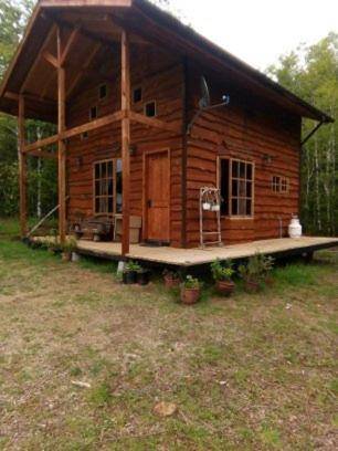 Cabaña entre Arboles