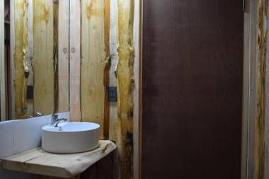 Proyecto COYAM cabañas lofts tinas privadas sendero por el bosque