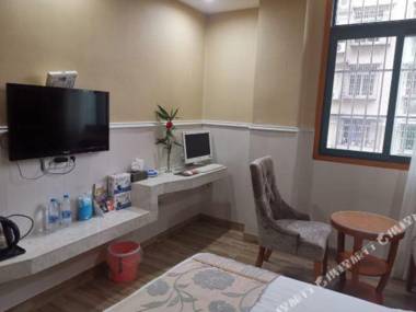 Yi Long Hua Chen Impress Business Hotel